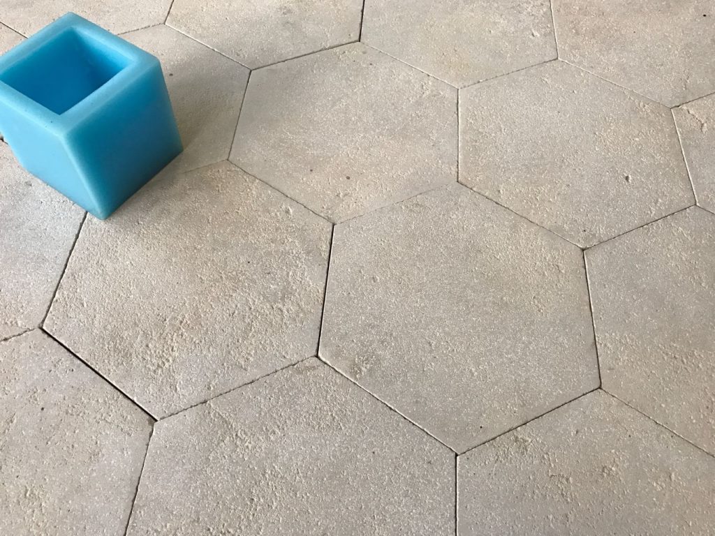 Antiqued limestone hexagon tiling replicate historic centuriesold stone