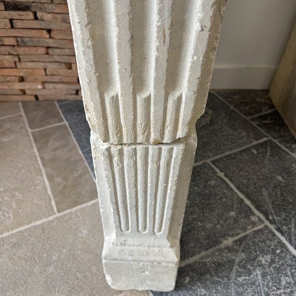 fluted jamb antique stone fireplace