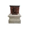 small wall fountain in limestone and brick