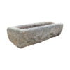 reclaimed granite trough with a rustic surface